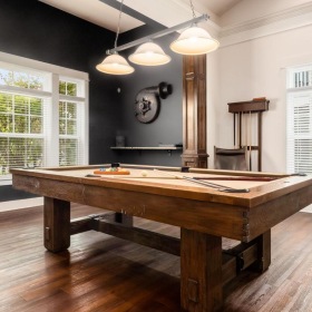 a room with a table and chairs